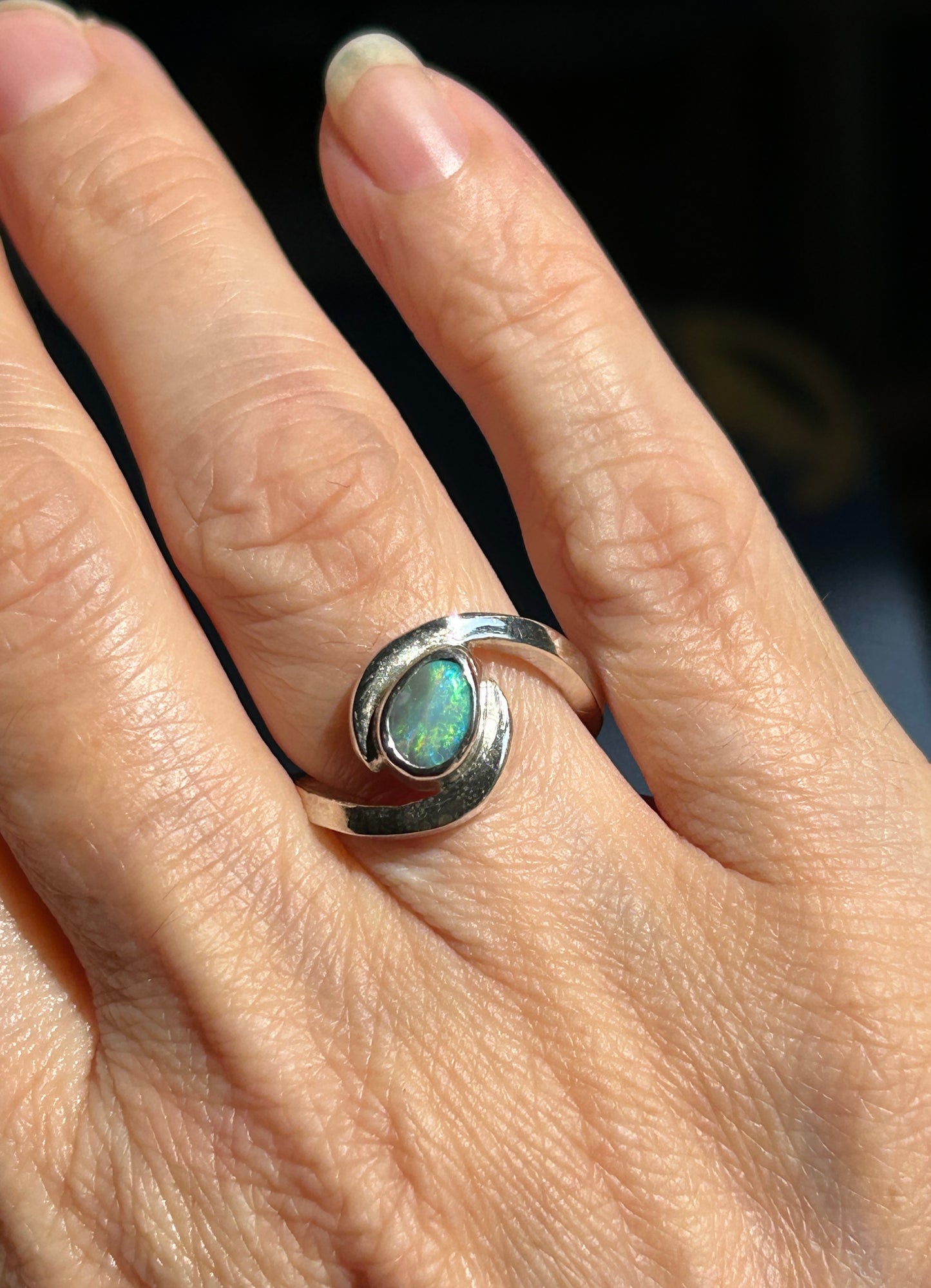 Green swirl ring