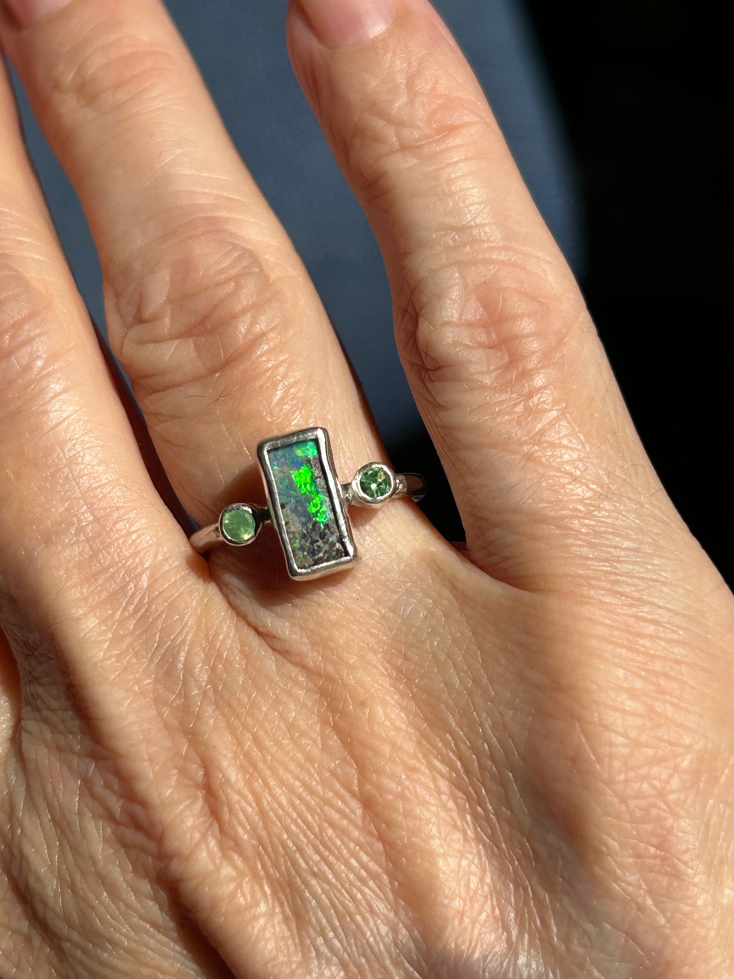 Green trilogy ring