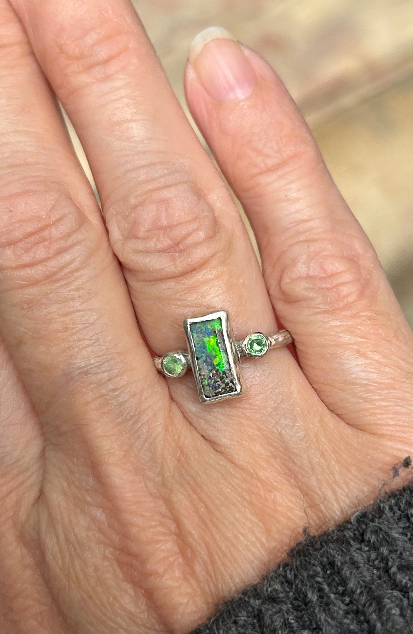 Green trilogy ring