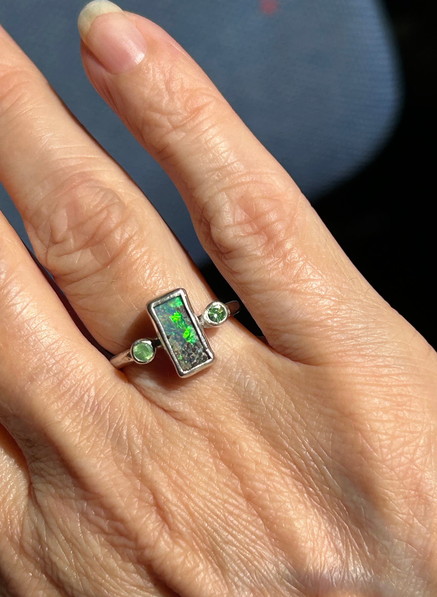 Green trilogy ring