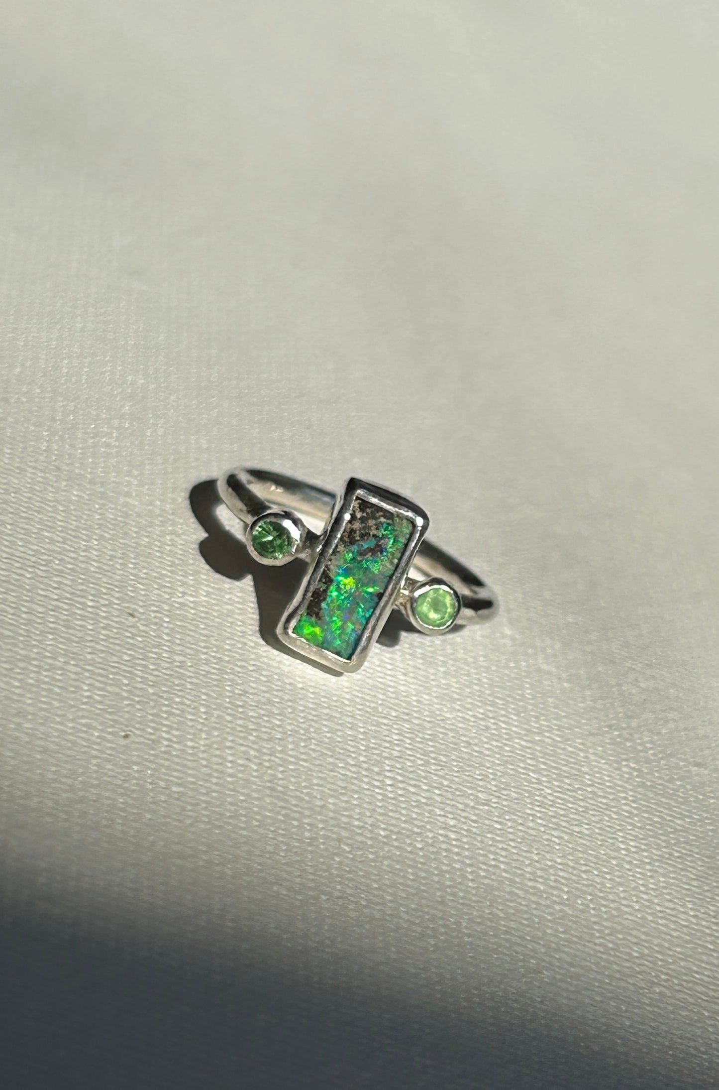 Green trilogy ring