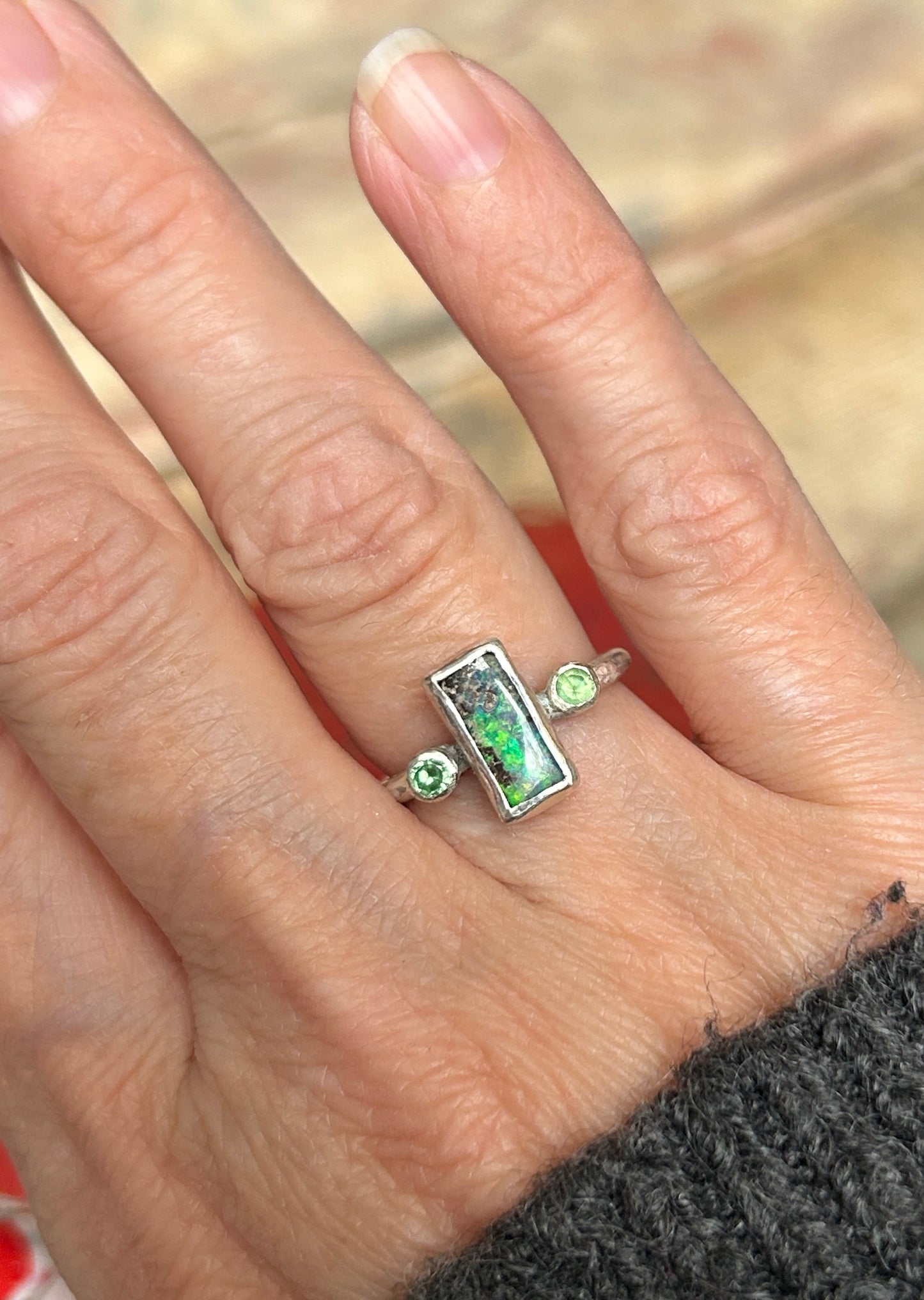 Green trilogy ring
