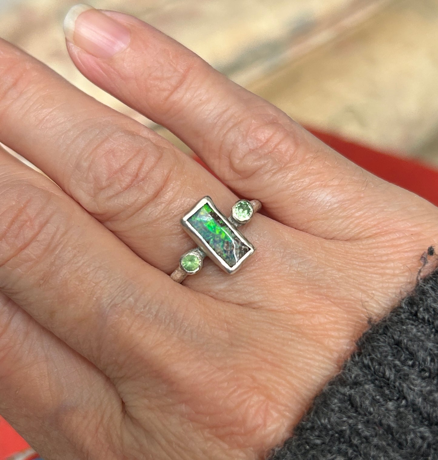 Green trilogy ring