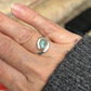 Green swirl ring