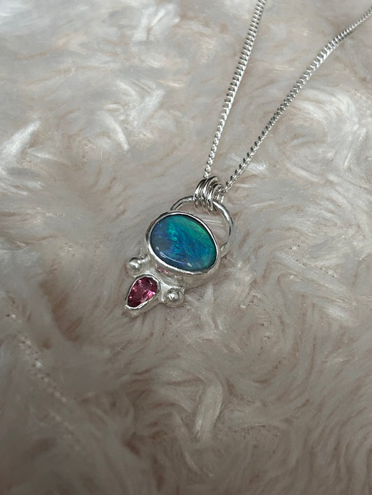 Opal and tourmaline pendant available