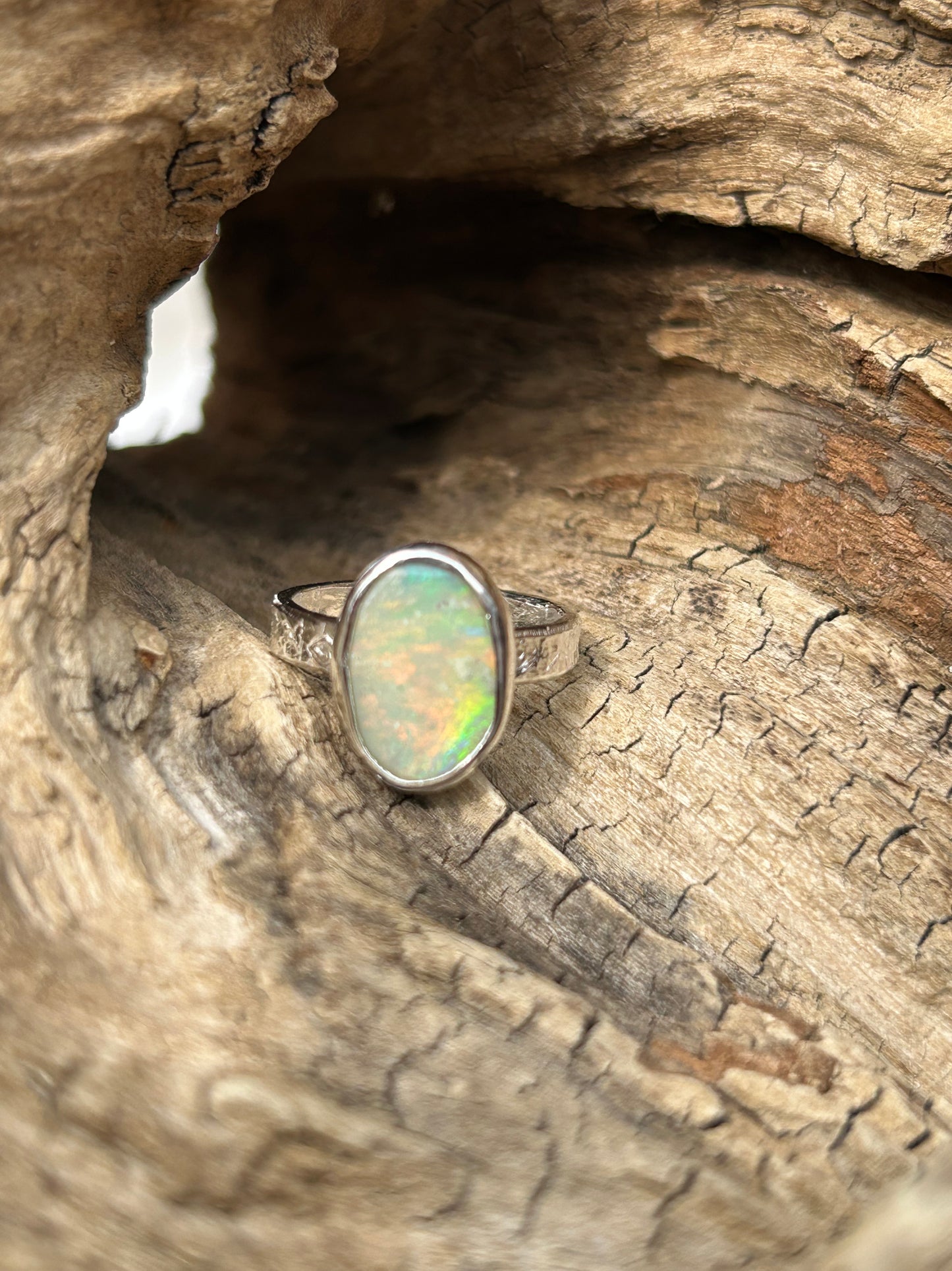 Solid Australian Lighting Ridge silver opal ring.