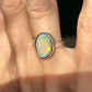 Solid Australian Lighting Ridge silver opal ring.