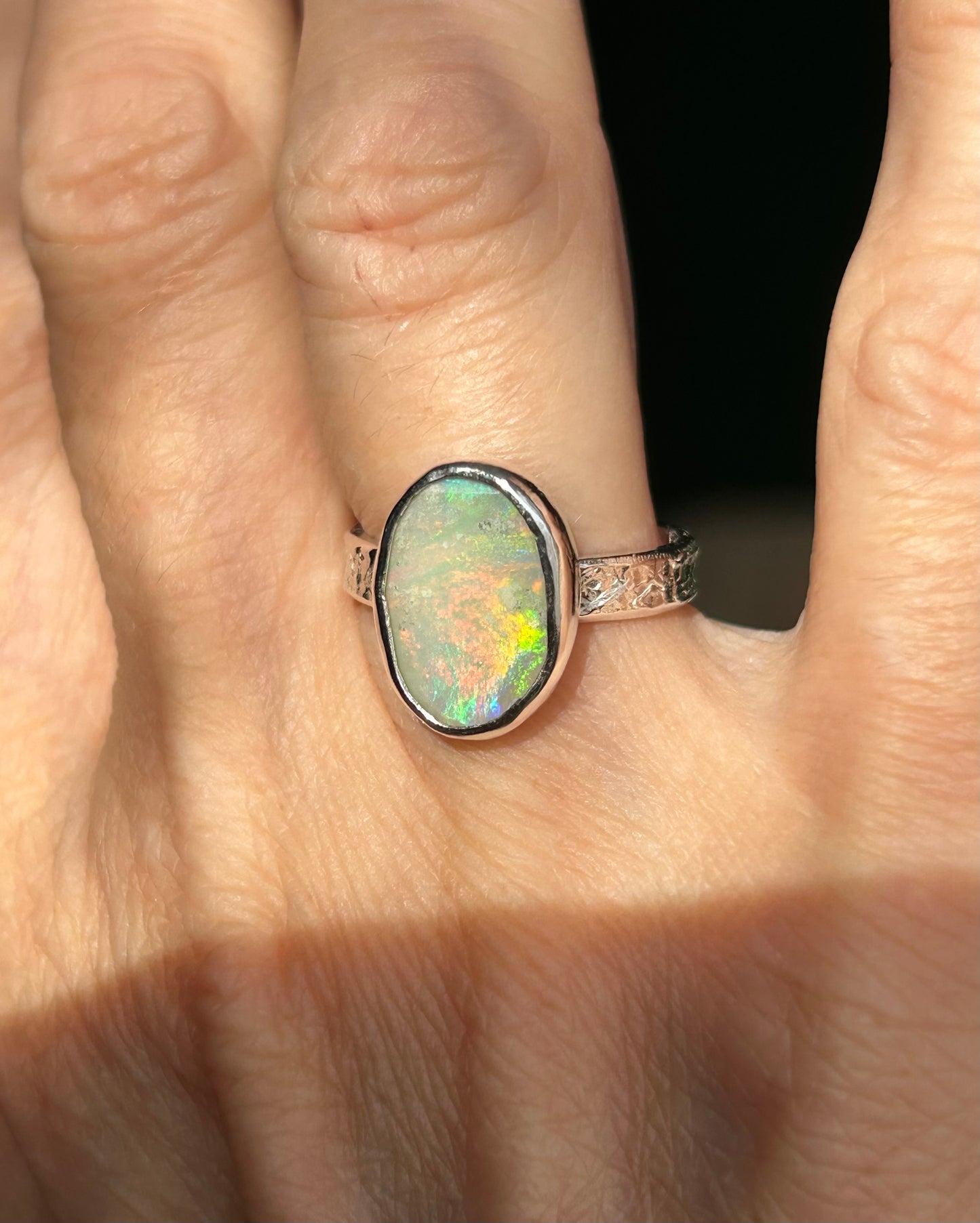 Solid Australian Lighting Ridge silver opal ring.