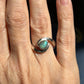 Green swirl ring