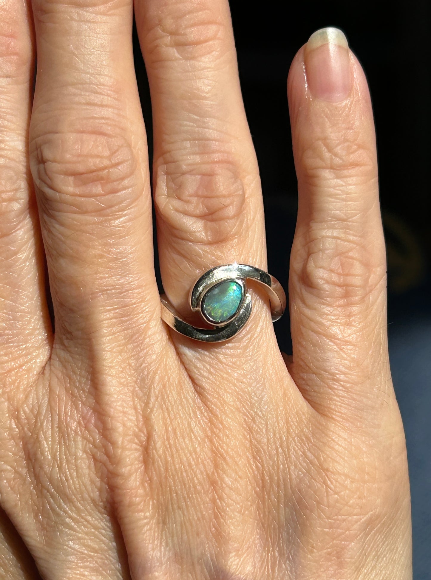 Green swirl ring