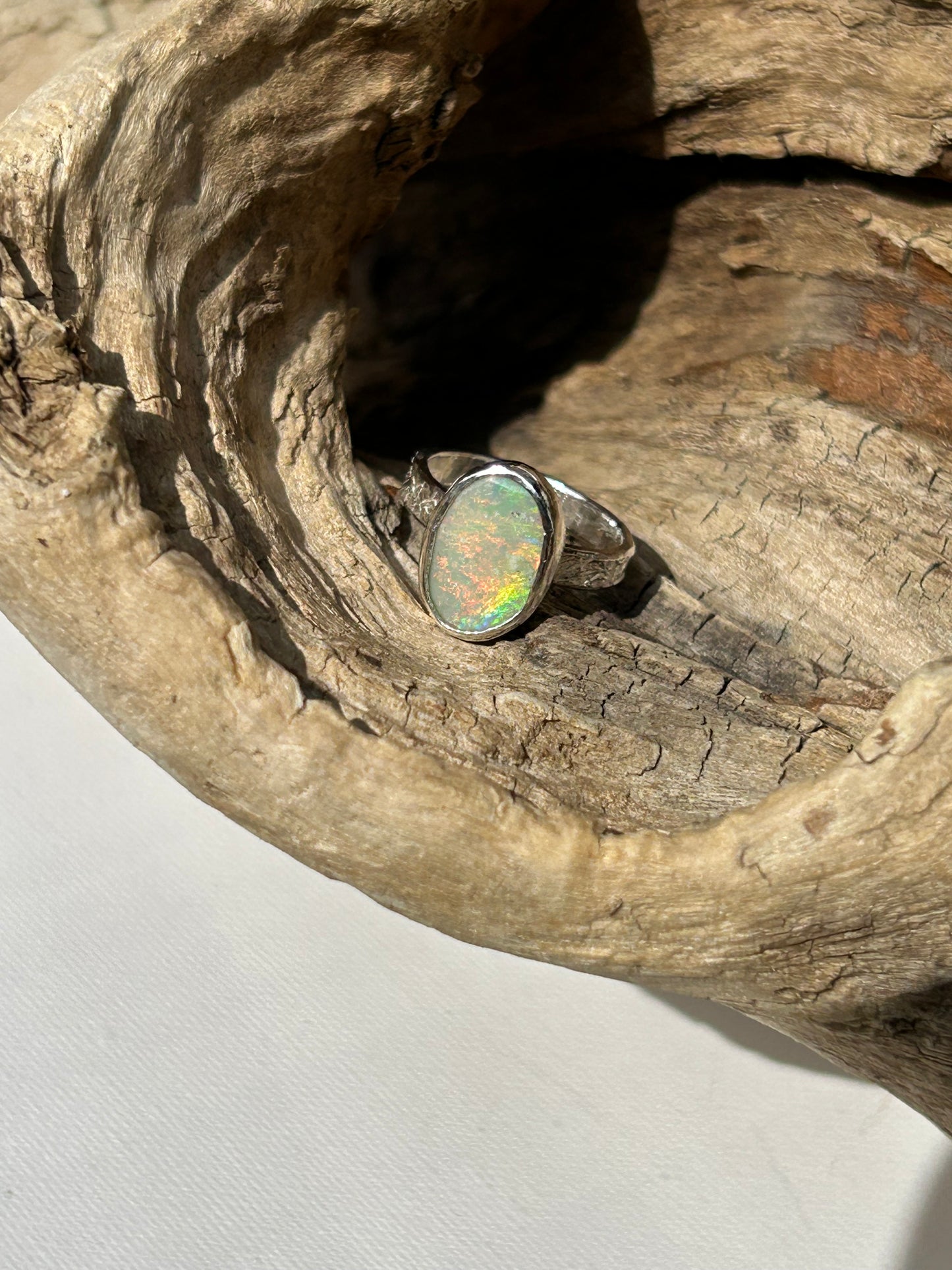 Solid Australian Lighting Ridge silver opal ring.