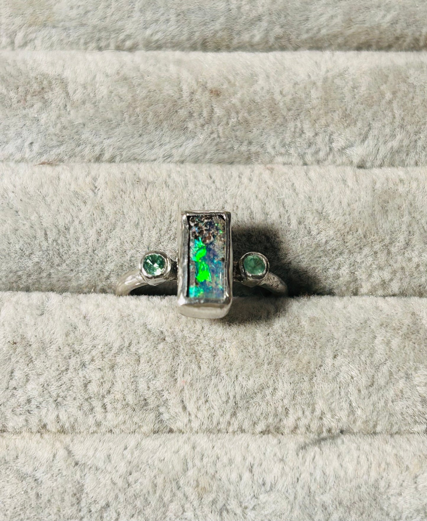 Green trilogy ring
