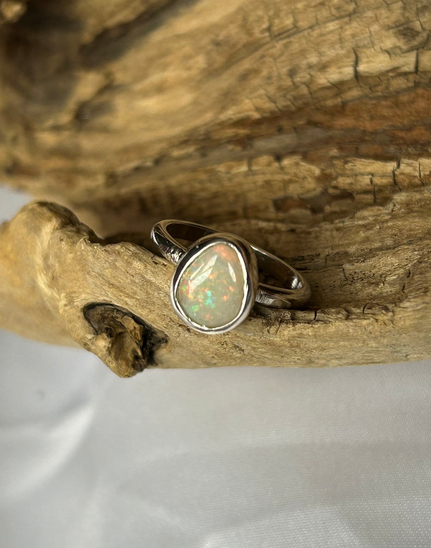 Teardrop solid opal ring