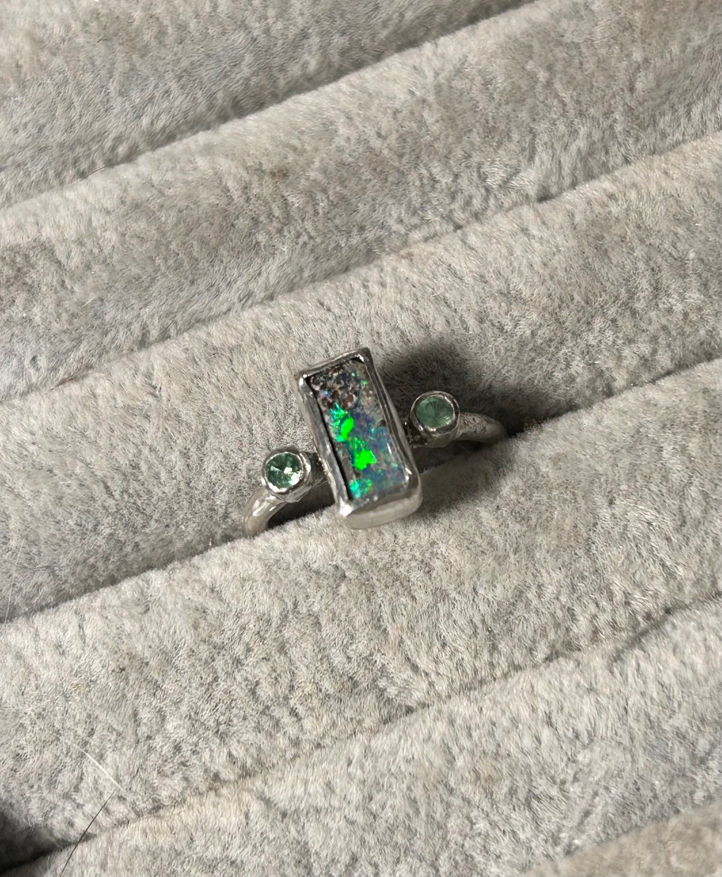 Green trilogy ring