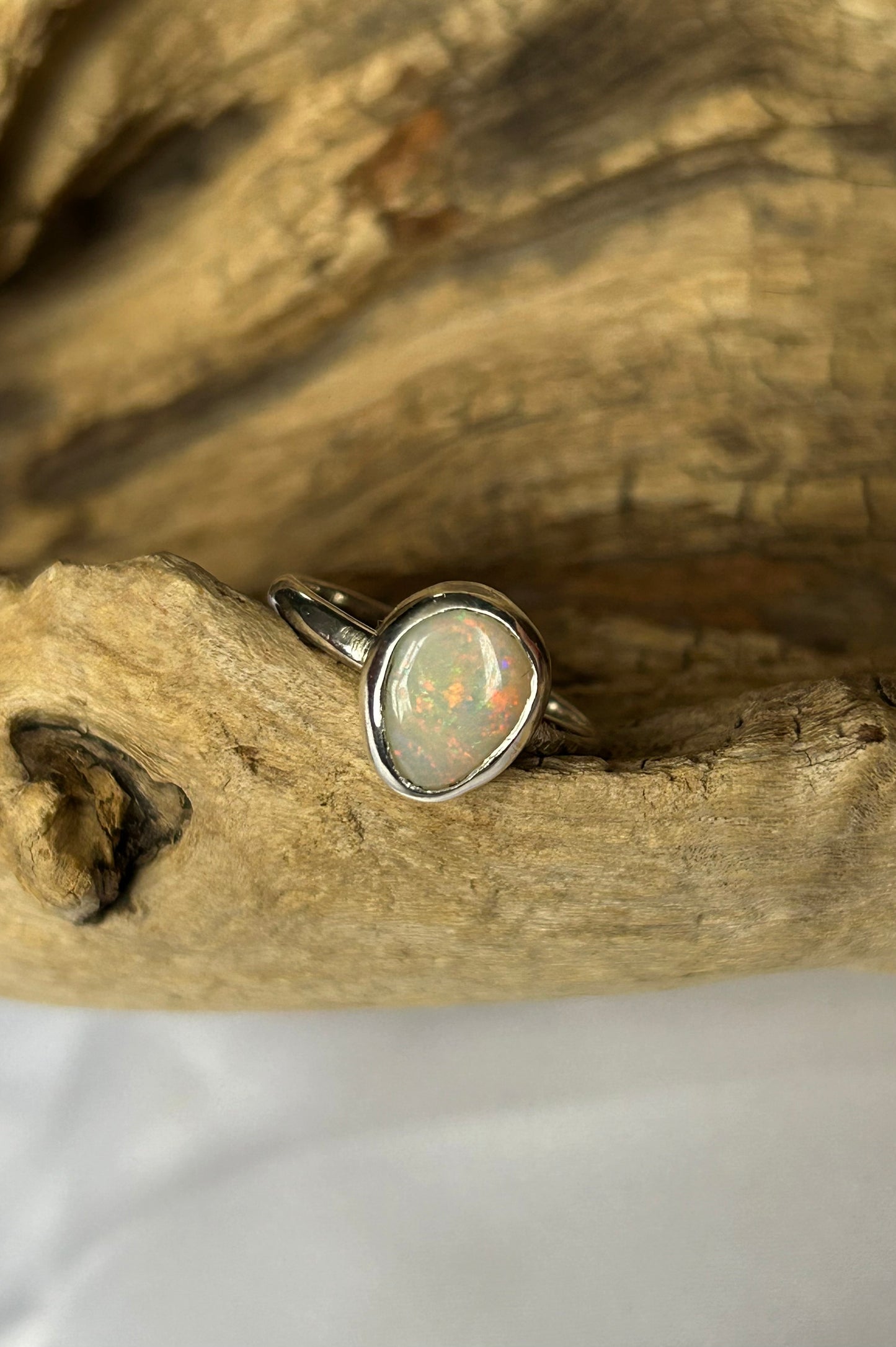 Teardrop solid opal ring