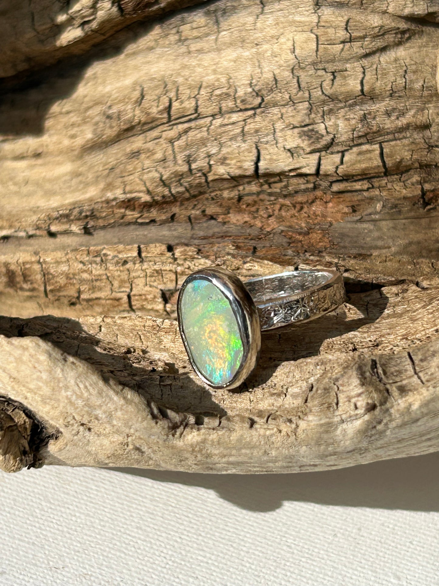 Solid Australian Lighting Ridge silver opal ring.