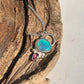 Opal and tourmaline pendant available