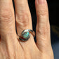 Green swirl ring