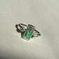 Green trilogy ring