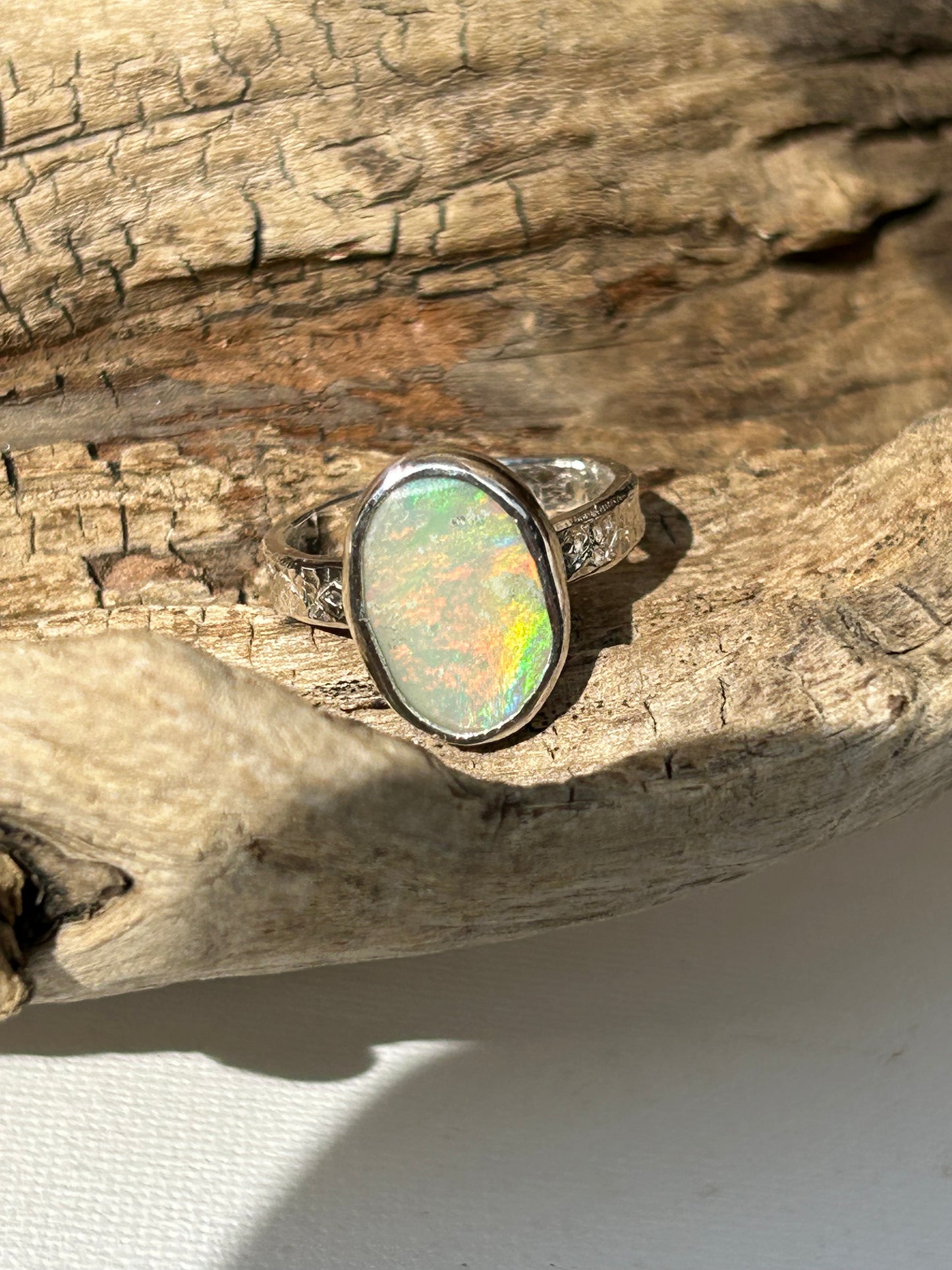 Solid Australian Lighting Ridge silver opal ring.