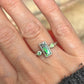 Green trilogy ring