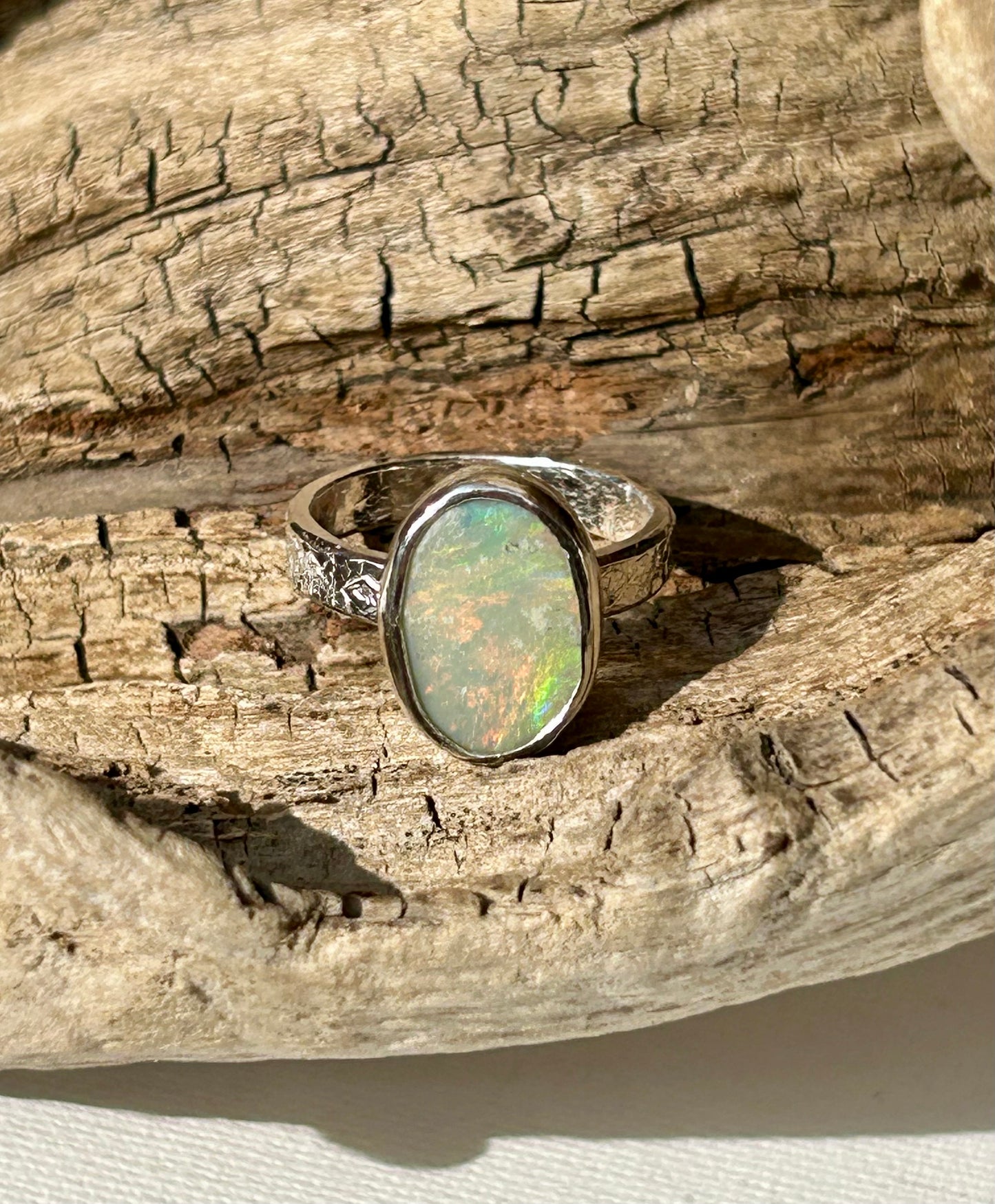 Solid Australian Lighting Ridge silver opal ring.