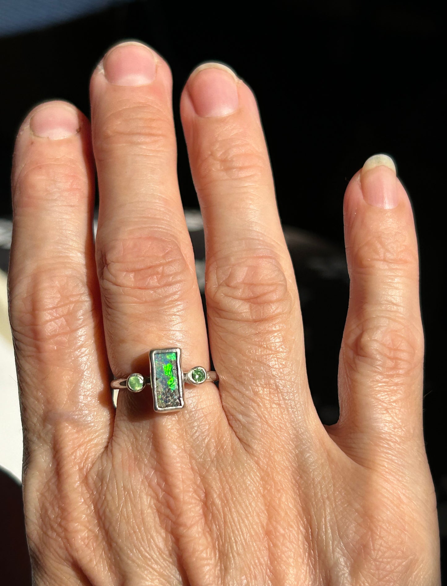 Green trilogy ring