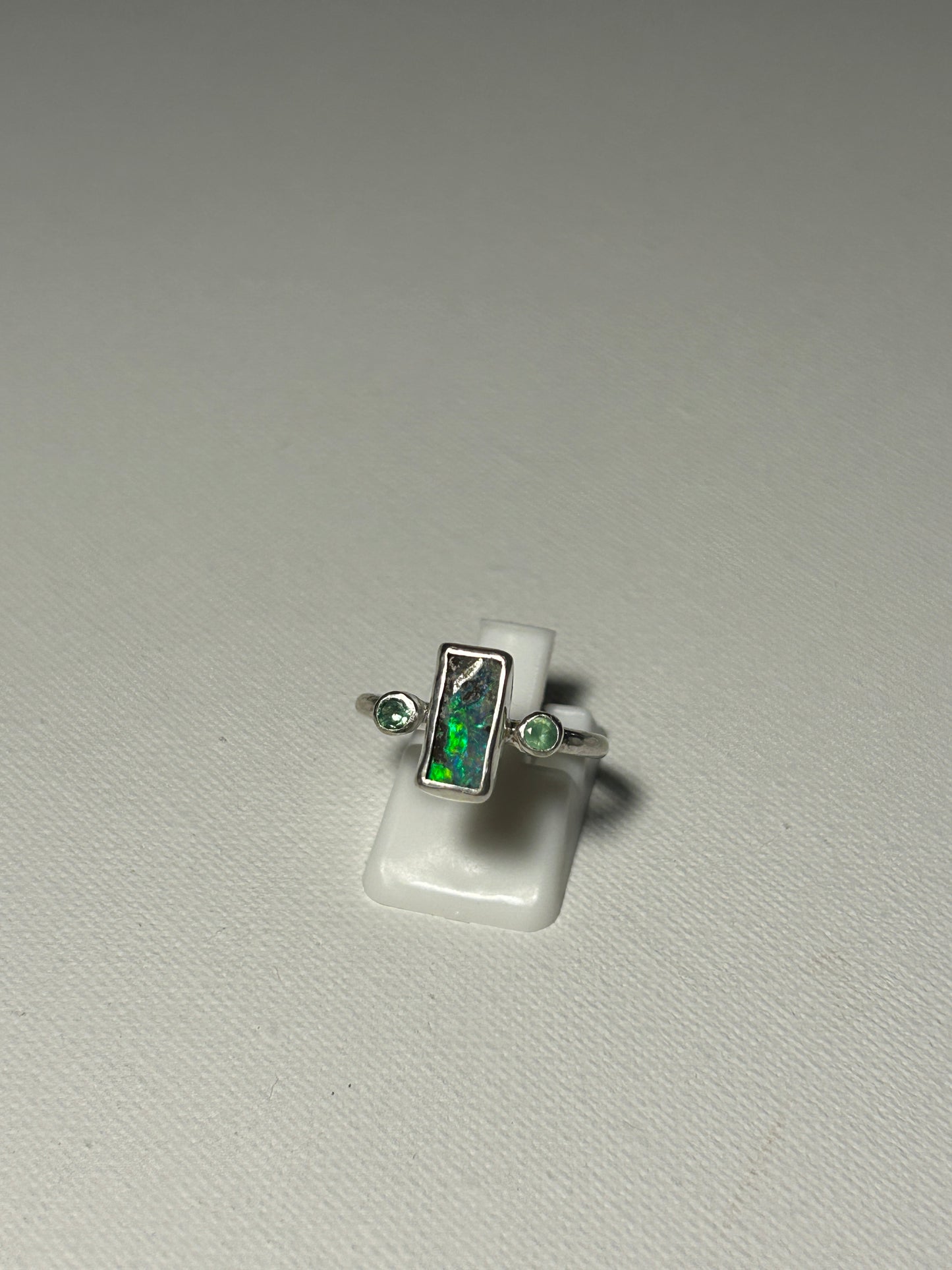 Green trilogy ring
